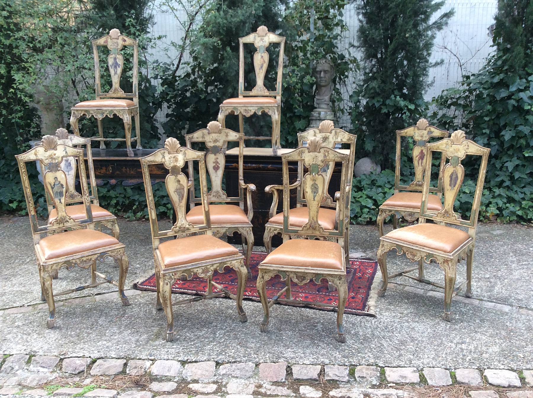 Set of ten fine, Venetian, Rococo style, painted and parcel-gilded dining chairs