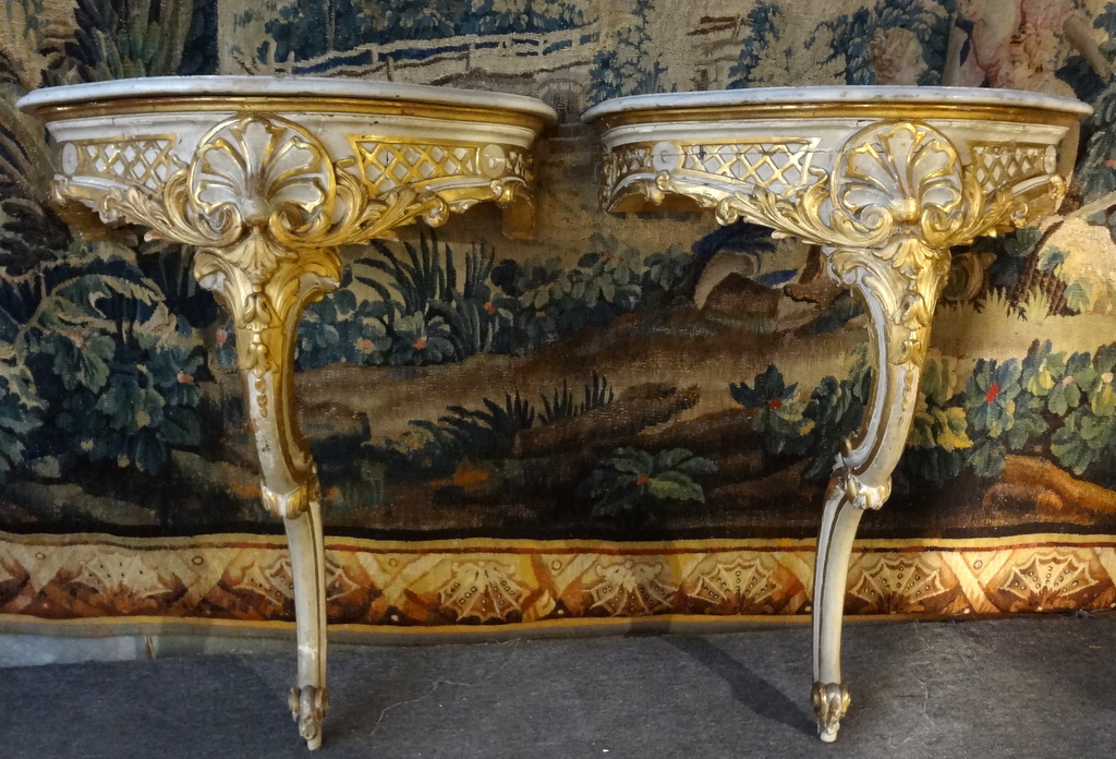 Pair of Venetian, Rococo period, painted and parcel-gilded console tables