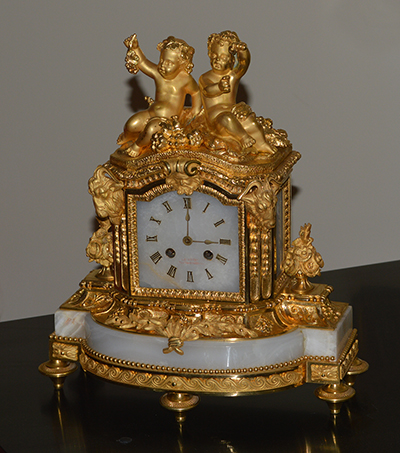 French, Louis XVI style, gilt bronze and alabaster mantle clock