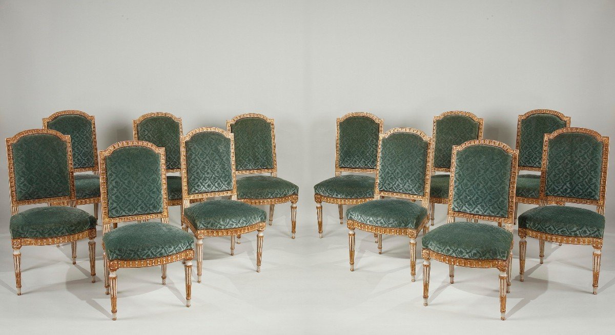Set of twelve French, Neoclassical style dining chairs