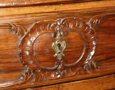 French, 18th century, carved sauteuse (two-drawer Proven&ccedil;al commode)