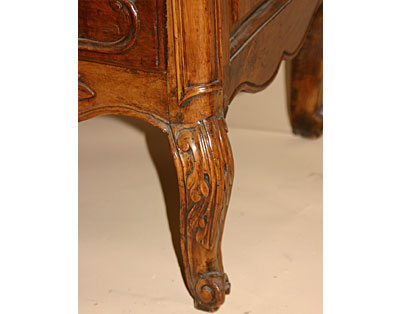 French, 18th century, carved sauteuse (two-drawer Proven&ccedil;al commode)