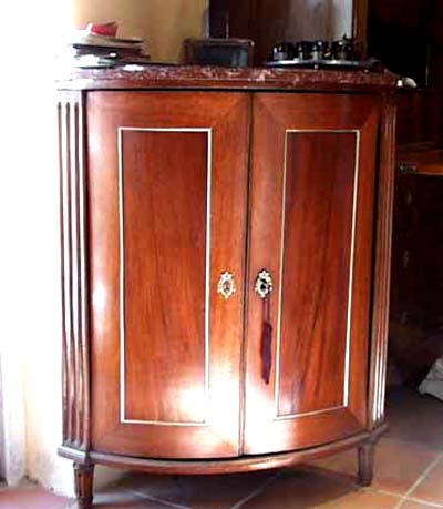Pair of Louis XVI style corner cabinets