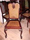 Set of six Italian, Louis XV style, walnut and cane dining chairs