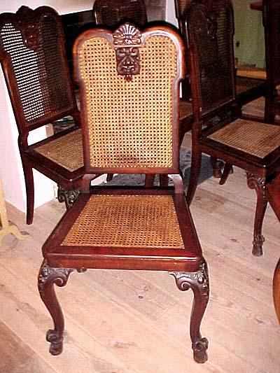 Set of six Italian, Louis XV style, walnut and cane dining chairs