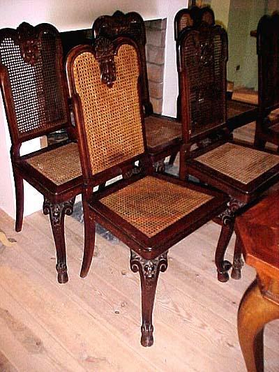 Set of six Italian, Louis XV style, walnut and cane dining chairs
