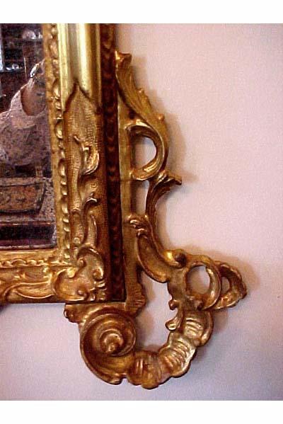 French, Regence style, carved giltwood mirror