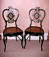 Pair of Napoleon III period, black lacquer chairs