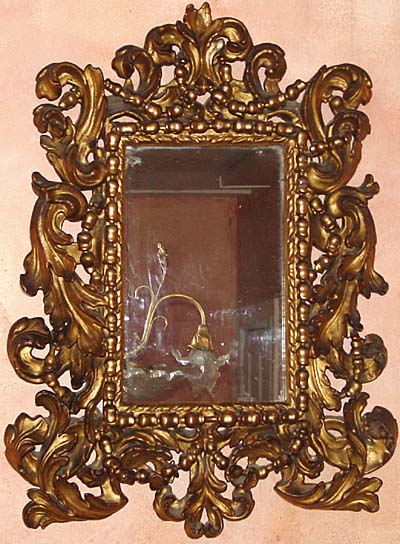 Florentine, Baroque, carved giltwood mirror