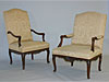 Companion pair of French Regence style Fauteuils