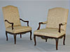 Companion pair of French Regence style Fauteuils