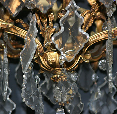 French, Louis XV style, bronze d'ore and cut glass, twelve-light chandelier