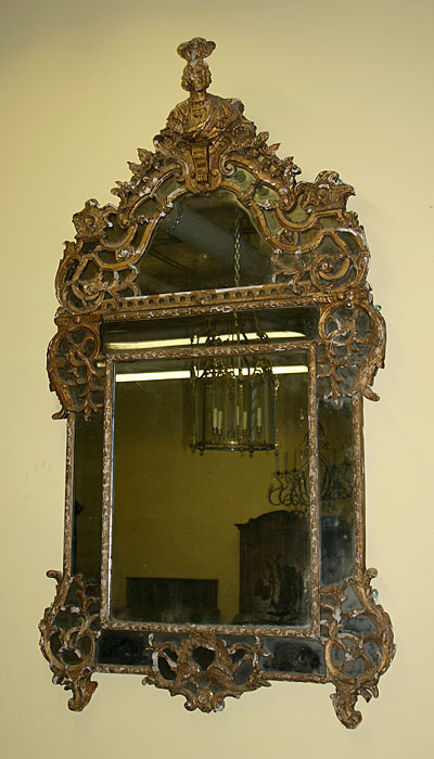 French, Regence period, carved, giltwood mirror