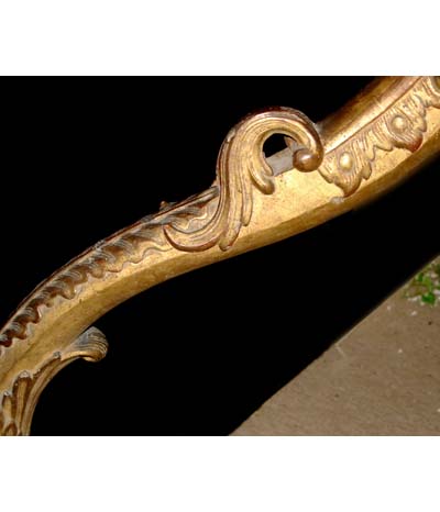 Pair of Louis XV period, carved giltwood corner consoles