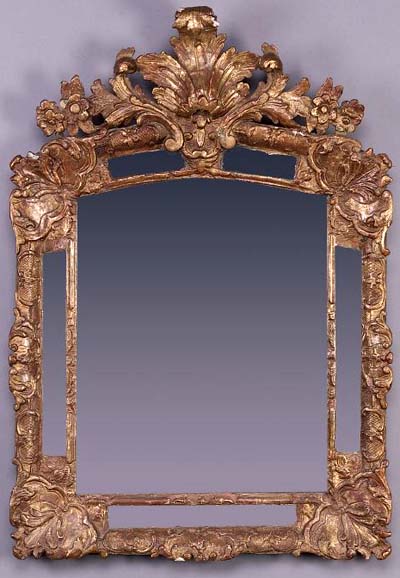 Regence period, carved giltwood mirror