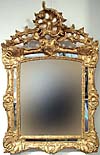 French, Regence period, carved giltwood mirror