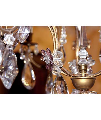 French, Louis XV style, gilt-iron and crystal, nine-arm chandelier