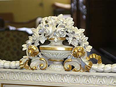 Italian, Neoclassical style, painted and parcel-gilded bed of large dimensions