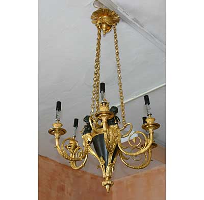 French, Neoclassical style, bronze d'ore and patinated bronze, six-arm chandelier
