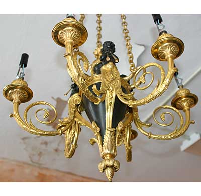 French, Neoclassical style, bronze d'ore and patinated bronze, six-arm chandelier