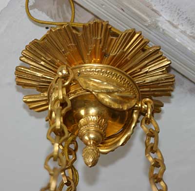 French, Neoclassical style, bronze d'ore and patinated bronze, six-arm chandelier