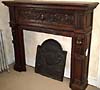 French, hand-carved wood fireplace mantel