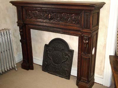 French, hand-carved wood fireplace mantel