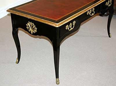 Italian, Regence period, black lacquer and gilt bronze bureau plat