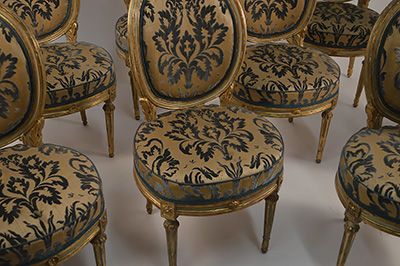 Set of eight, very fine Northern Italian, painted and parcel-gilded dining chairs