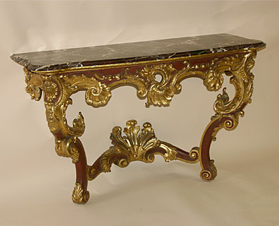 Fine pair of Continental, Louis XV style, red painted and parcel gilded console tables