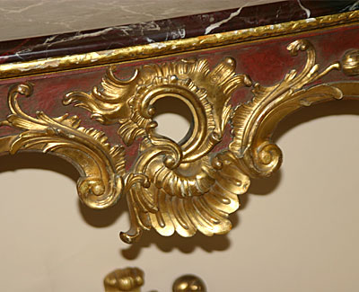 Fine pair of Continental, Louis XV style, red painted and parcel gilded console tables