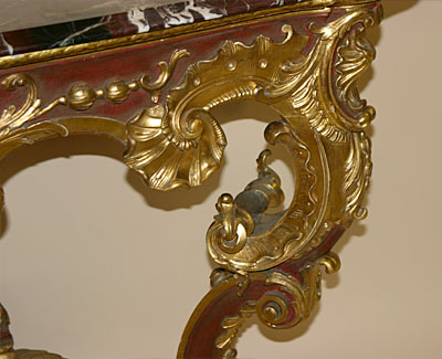 Fine pair of Continental, Louis XV style, red painted and parcel gilded console tables