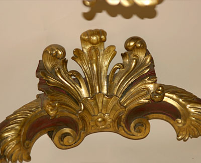 Fine pair of Continental, Louis XV style, red painted and parcel gilded console tables