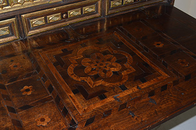 Spanish, iron-mounted, polychrome, parcel-gilt and bone-inlaid Vargue�o (travelling trunk on stand)