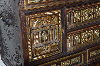 Spanish, iron-mounted, polychrome, parcel-gilt and bone-inlaid Vargue�o (travelling trunk on stand)