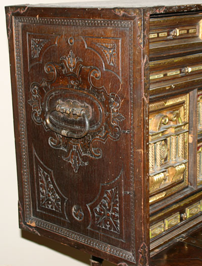 Spanish, iron-mounted, polychrome, parcel-gilt and bone-inlaid Vargue�o (travelling trunk on stand)