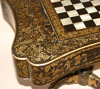 Very fine, Chinese export, black lacquer and Parcil gilt games table