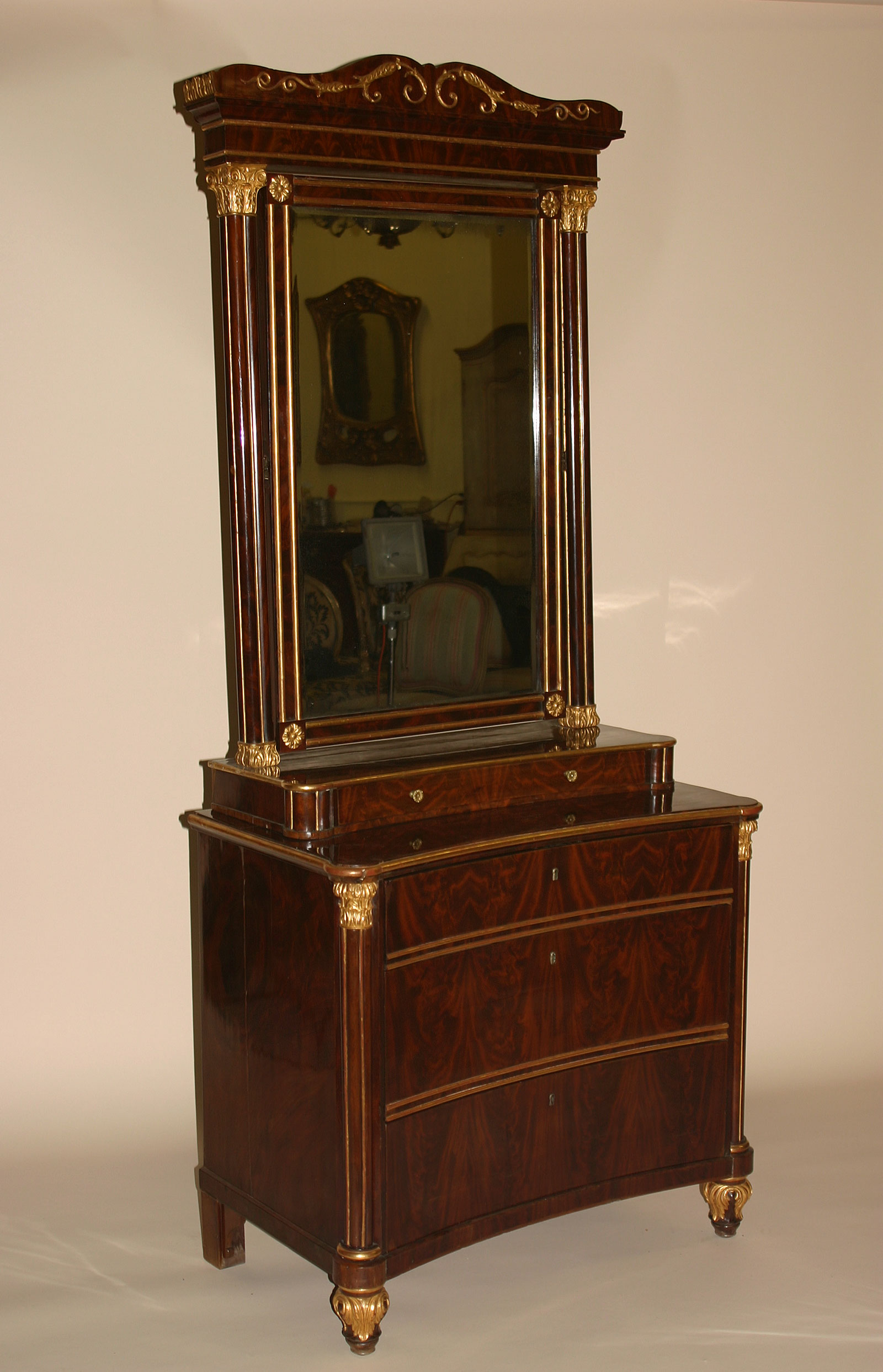 Very fine, Spanish, Neoclassical, flame mahogany and parcel-gilt coiffeuse