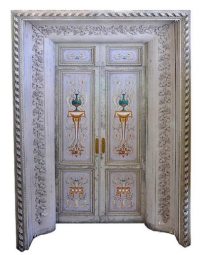 Pair of very fine, rare, late Louis XVI polychrome decorated doors within a door surround