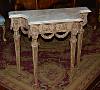 Fine, Italian, Neoclassical period, painted and parcel-gilded, diminutive console table